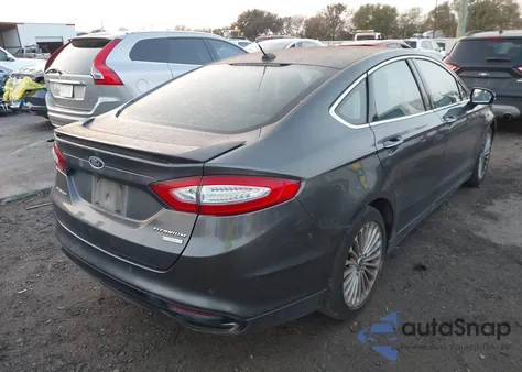 2016 Ford Fusion Titanium z USA, uszkodzony, nr VIN 3FA6P0K9XGR117621
